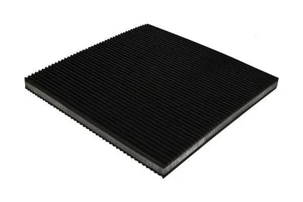 API-C pad: copolymer layer between two ribbed rubber layers
